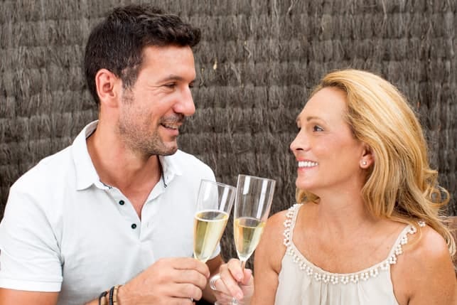 a couple drinking champagne together