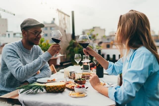 a couple having dinner together in a cafe