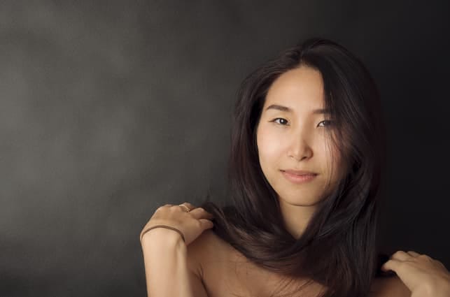 a portrait of a young Mongolian woman