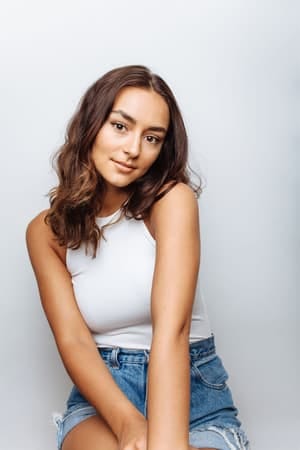 a cute natural girl smiles softly