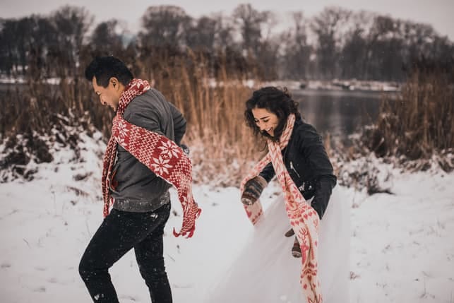 a couple walking outside in winter