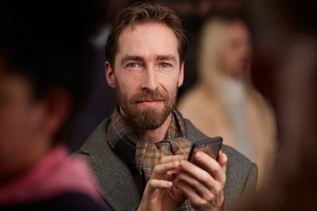 sweet Austrian men with a phone