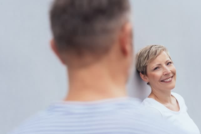 a mature couple looking at each other